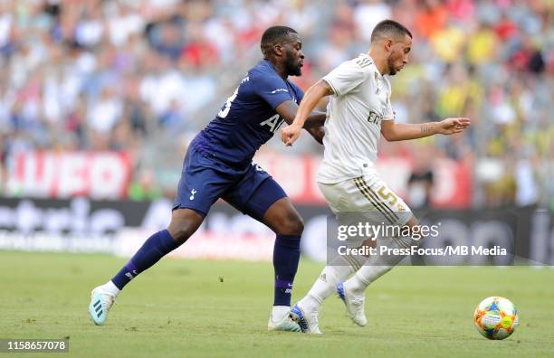 Georges-Kévin Nkoudou of Tottenham Hotspur competes with Eden Hazard of Real Madrid during the Audi Cup 2019 semi final match between Real Madrid and...
