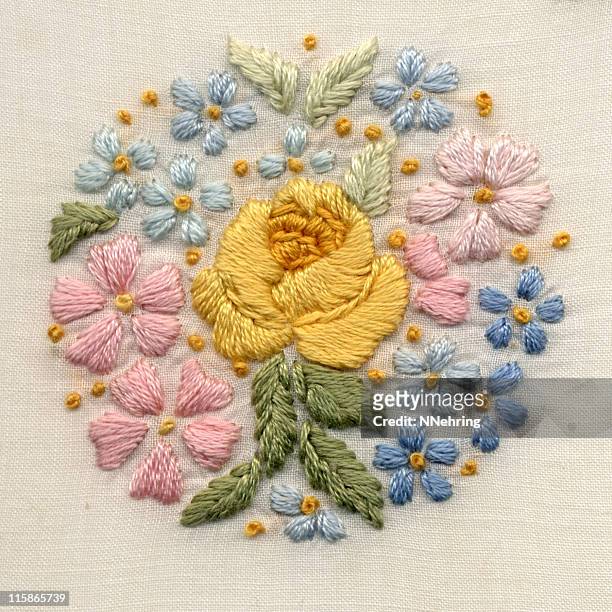 hand-embroidered flower motif - antique foliage stock pictures, royalty-free photos & images