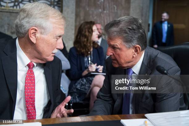Sens. Angus King, I-Maine, left, and Joe Manchin, D-W.Va., are seen during the Senate Armed Services Committee confirmation hearing for Air Force...