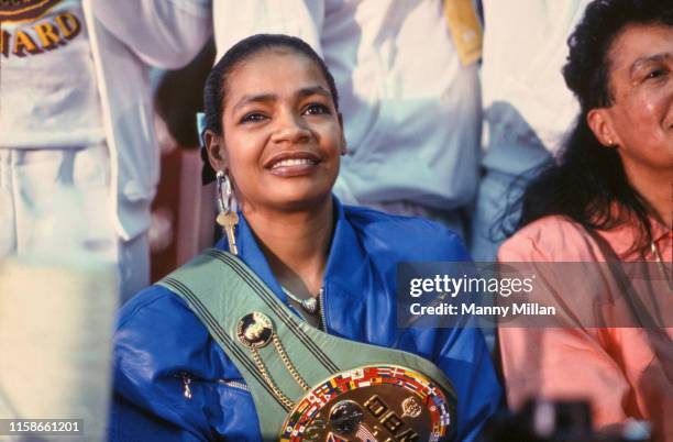 Middleweight Title: Closeup portrait of Sugar Ray Leonard's wife, Juanita Wilkinson, wearing his championship belt during a press conference after...