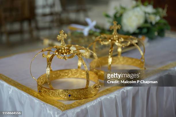 orthodox wedding - crowns and candles, sozopol, burgas, bulgaria - orthodox stock pictures, royalty-free photos & images