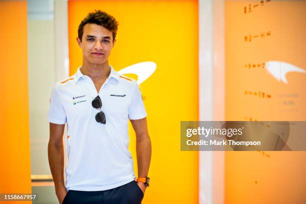 Lando Norris of Great Britain and McLaren F1 poses for a photo in the Paddock during previews ahead of the F1 Grand Prix of Austria at Red Bull Ring...