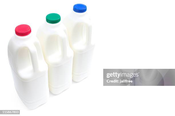 three large bottles of milk on a white with path - milk bottles stock pictures, royalty-free photos & images