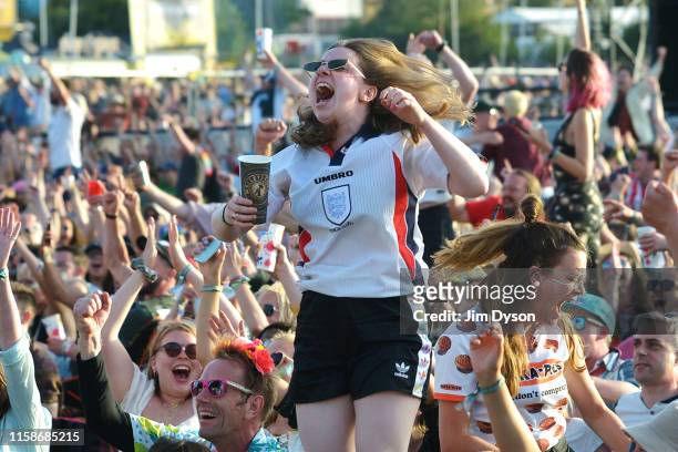 England fans celebrate the first goal of the Women's World Cup Quarter Final between England and Norway, during day two of Glastonbury Festival at...