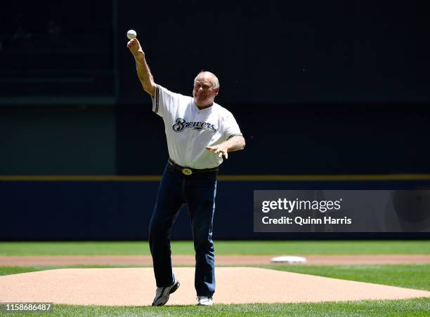 Green Bay Packers hall of famer Jerry Kramer throws a ceremonial first pitch before the game between the Milwaukee Brewers and the Seattle Mariners...