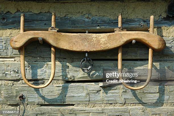 ox yoke hanging on wooden wall - yoke stock pictures, royalty-free photos & images