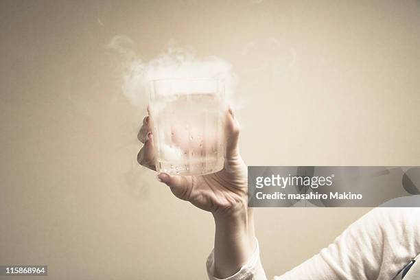 dry ice in water - dry ice stock pictures, royalty-free photos & images
