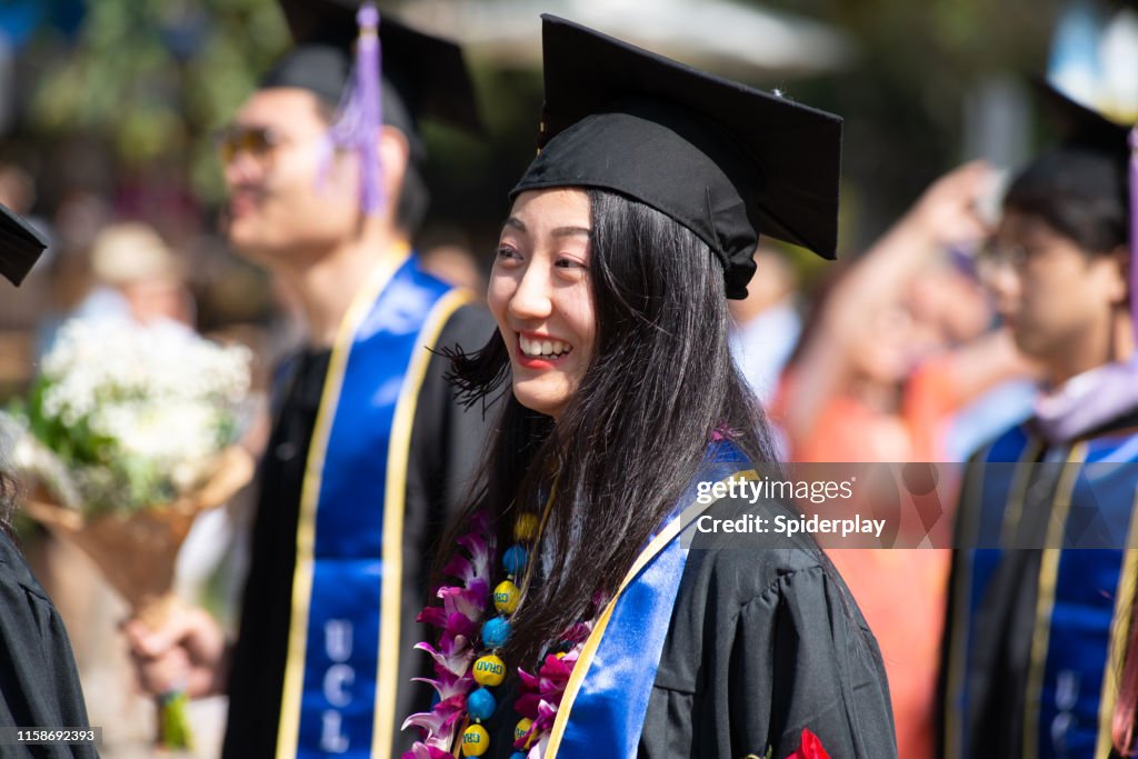 Gradution Walk Students Walk In Graduation Procession Wearing Cap And Gown High-Res ...