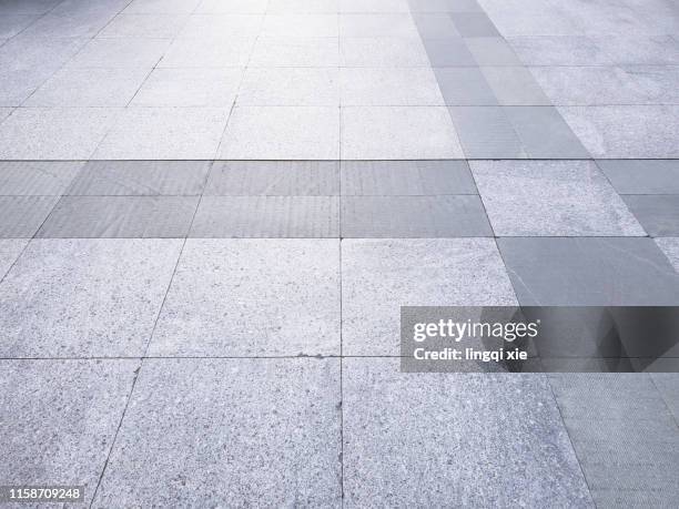 neatly arranged floor tiles texture - pedestrian path stock pictures, royalty-free photos & images