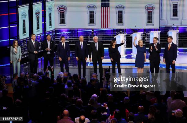 Democratic presidential candidates Marianne Williamson, former Colorado governor John Hickenlooper, former tech executive Andrew Yang, South Bend,...