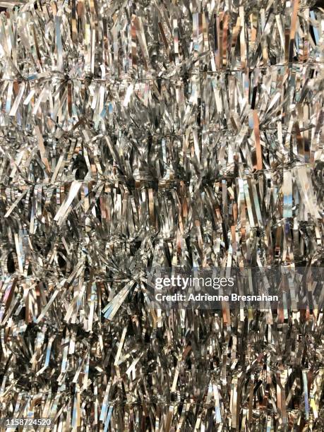 tinsel wall - lametta stock-fotos und bilder