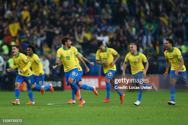 Players of Brazil celebrate after winning in the penalty shootout the Copa America Brazil 2019 quarterfinal match between Brazil and Paraguay at...