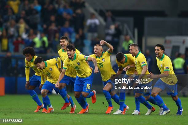 Players of Brazil celebrate after winning in the penalty shootout the Copa America Brazil 2019 quarterfinal match between Brazil and Paraguay at...