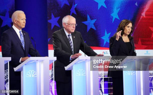 Democratic presidential candidates former Vice President Joe Biden, Sen. Bernie Sanders and Sen. Kamala Harris take part in the second night of the...