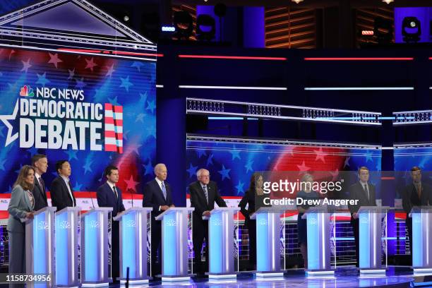 Democratic presidential candidates Marianne Williamson, former Colorado governor John Hickenlooper, former tech executive Andrew Yang, South Bend,...