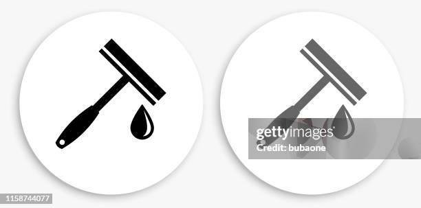 window wiper black and white round icon - windshield wiper stock illustrations