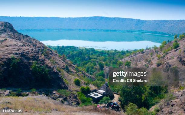 lonar lake or lonar crater,  maharashtra, india. - maharashtra stockfoto's en -beelden