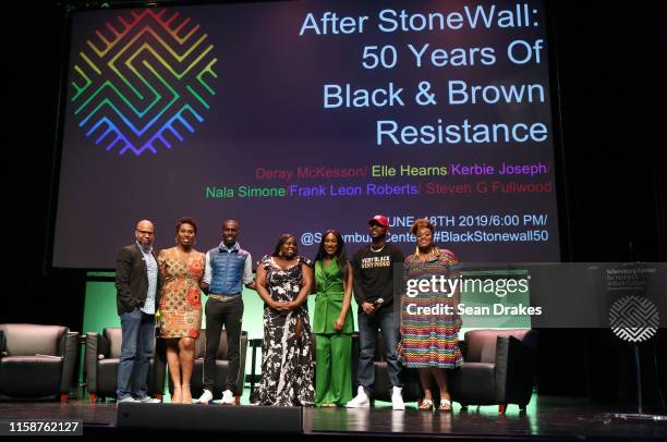 Steven G. Fullwood, Nala Simone, DeRay McKesson, Kerbie Joseph, Elle Hearns, Frank Leon Roberts and Aisha Diori pose at the panel discussion titled...