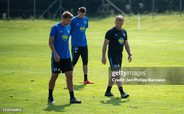 Niklas Stark, Rune Almenning Jarstein and assistant coach Mirko Dickhaut of Hertha BSC during the training camp on July 31, 2019 at the...