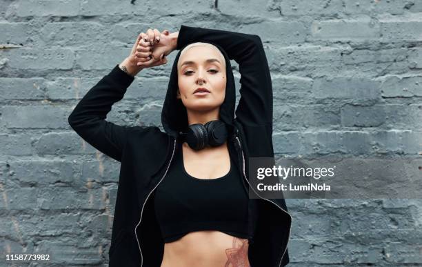 confident with my body - hoodie headphones stock pictures, royalty-free photos & images