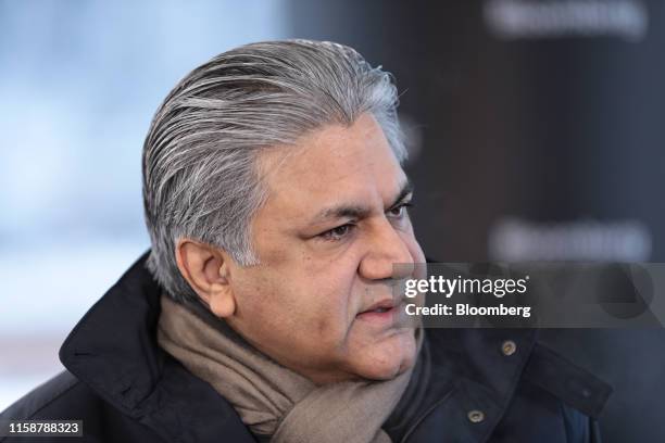 Arif Naqvi, chief executive officer of Abraaj Capital Ltd., speaks during a Bloomberg Television interview at the World Economic Forum in Davos,...