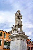 Monument to Italian linguist Niccolo Tommaseo in Venice, Italy