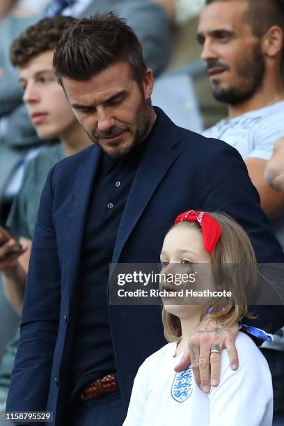 Harper Beckham, daughter of David Beckham sings the national anthem with her father during the 2019 FIFA Women's World Cup France Quarter Final match...