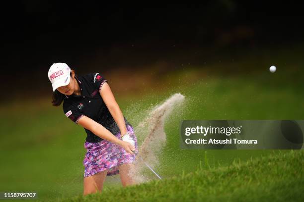 Rie Tsuji of Japan hits out from a bunker on the 7th hole during the second round of the Earth Mondamin Cup at the Camellia Hills Country Club on...