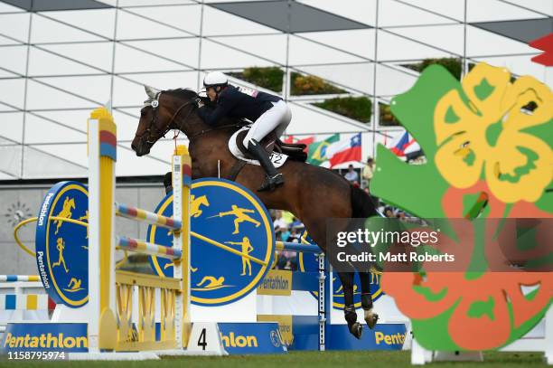 Elodie Clouvel of France competes during the women's riding show jumping on day two of the UIPM World Cup, Modern Pentathlon test event for the Tokyo...