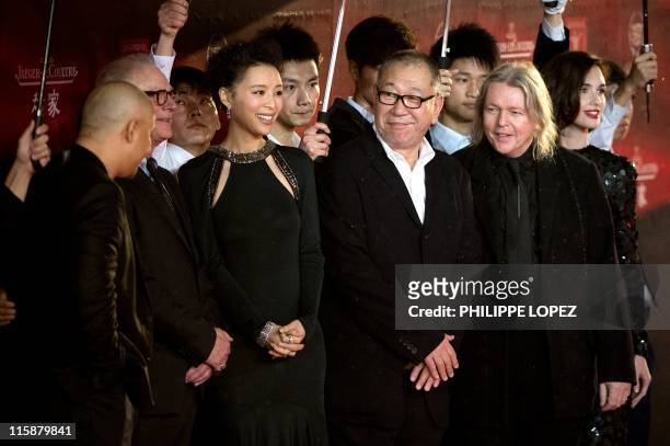 Members of the jury US director Barry Levinson , Chinese actress Zhang Jingchu , Japanese film director Yoichi Sai and British film director...