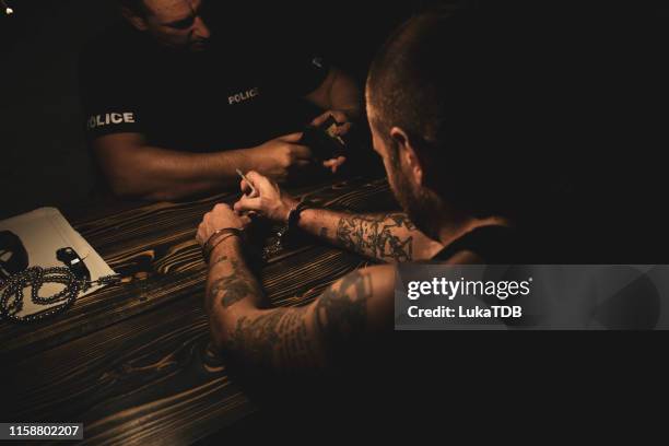 pointing to the criminal - prison gang stock pictures, royalty-free photos & images