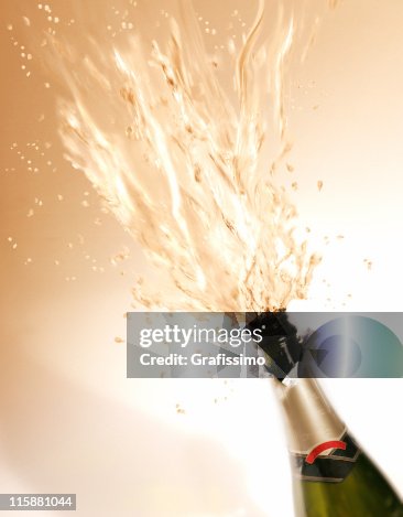 Exploding Bottle Of Champagne High-Res Stock Photo - Getty Images