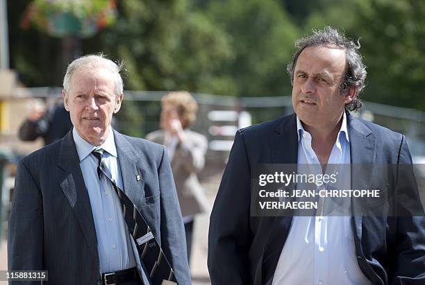 President Michel Platini and his father Aldo arrive, on June 11 prior to attending a general assembly of the Lorraine Football League in Joeuf,...