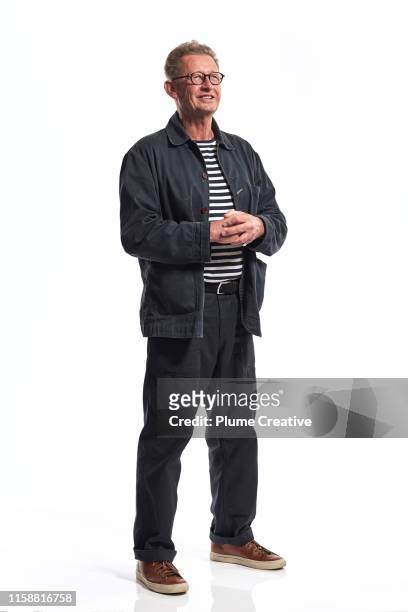 portrait of mature man in studio - full body isolated stockfoto's en -beelden