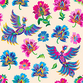 Decorative floral seamless pattern in Ukrainian folk painting style. Bright fantasy birds, flowers, leaves on a beige background. Batik, book cover, poster, textile print, wallpaper, wrapping paper