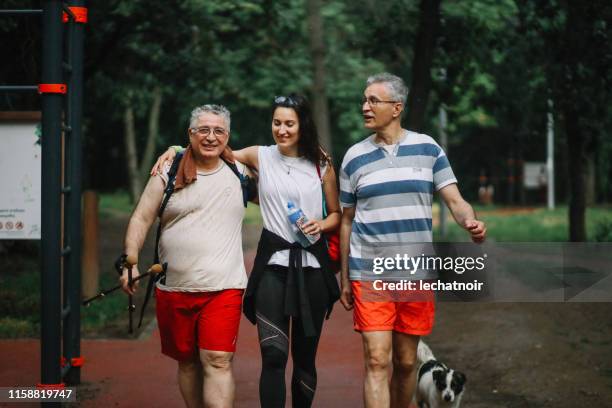 female coach training senior men - senior people training imagens e fotografias de stock