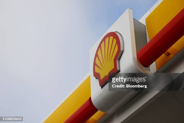 Signage is displayed outside a Royal Dutch Shell Plc gas station in Redondo Beach, California, U.S., on Sunday, July 28, 2019. Royal Dutch Shell is...