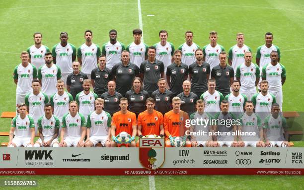 July 2019, Bavaria, Augsburg: Soccer Bundesliga: Photo shoot for FC Augsburg for the 2019/20 season in the WWK-Arena. First row front Mads Pedersen,...