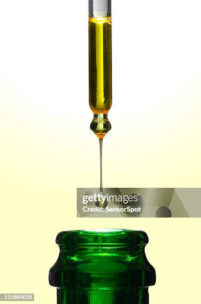 pure olive oil - pipette stock-fotos und bilder