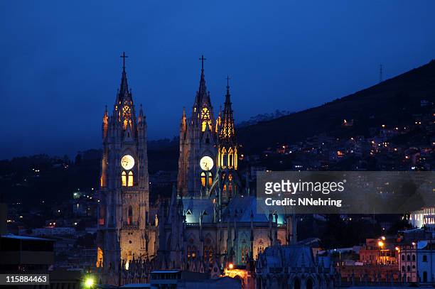 the basilica of the national vow, quito, ecuador, at night - quito stock pictures, royalty-free photos & images