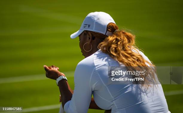 Serena Williams of the United States looks frustrated during a practice session before the start of The Championships - Wimbledon 2019 at the All...