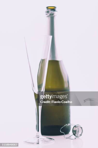 champagne bottle and glass - prosecco stock-fotos und bilder
