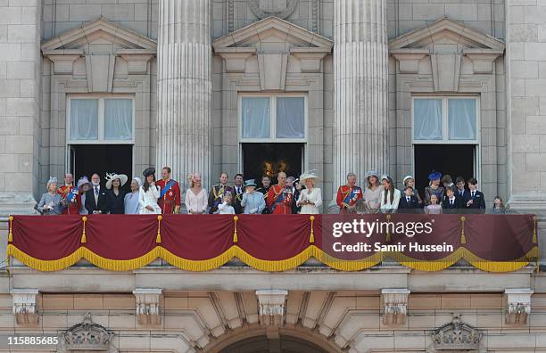 Queen Elizabeth ll and Prince Philip, Duke of Edinburgh, surrounded by members of the Royal Family, stand on the balcony of Buckingham Palace...