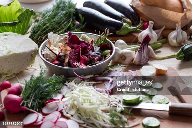 preparing vegan meal, food waste ready to composting - leftovers stockfoto's en -beelden