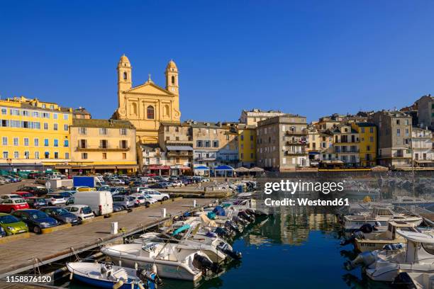 france, corsica, bastia, old harbour with st. john baptist church - bastia stock pictures, royalty-free photos & images