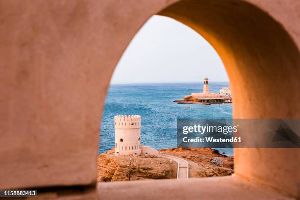 watch tower of ayjah castle, sur, oman - oman stockfoto's en -beelden