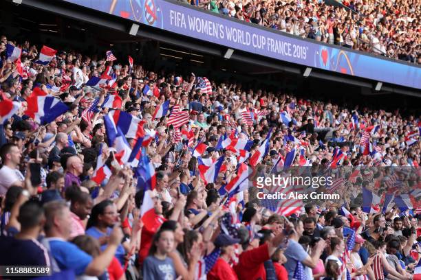 Fans show their support during the 2019 FIFA Women's World Cup France Quarter Final match between France and USA at Parc des Princes on June 28, 2019...