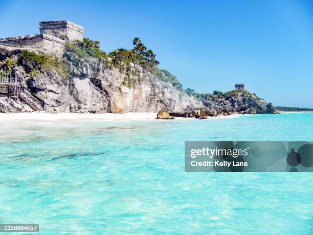 tulum ruins from the caribbean sea - tulum foto e immagini stock