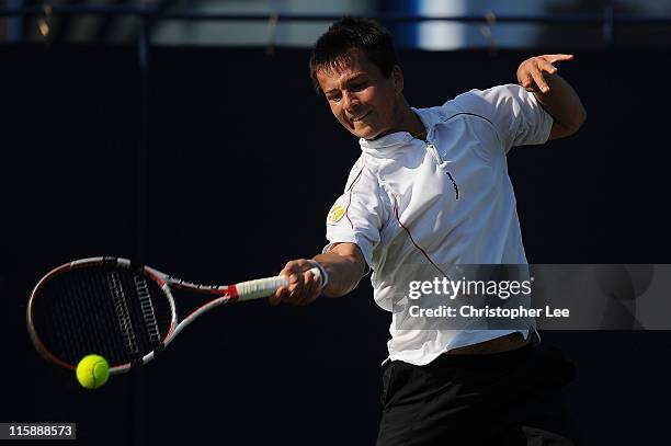 James Marsalek of Great Britain in action during the 1st Round Qualifying match against Toby Martin of Great Britain for the AEGON International on...