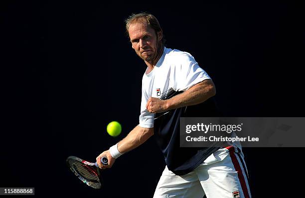 Rainer Schuettler of Germany in action during the 2nd Round Qualifying match against Marcus Willis of Great Britain for the AEGON International on...